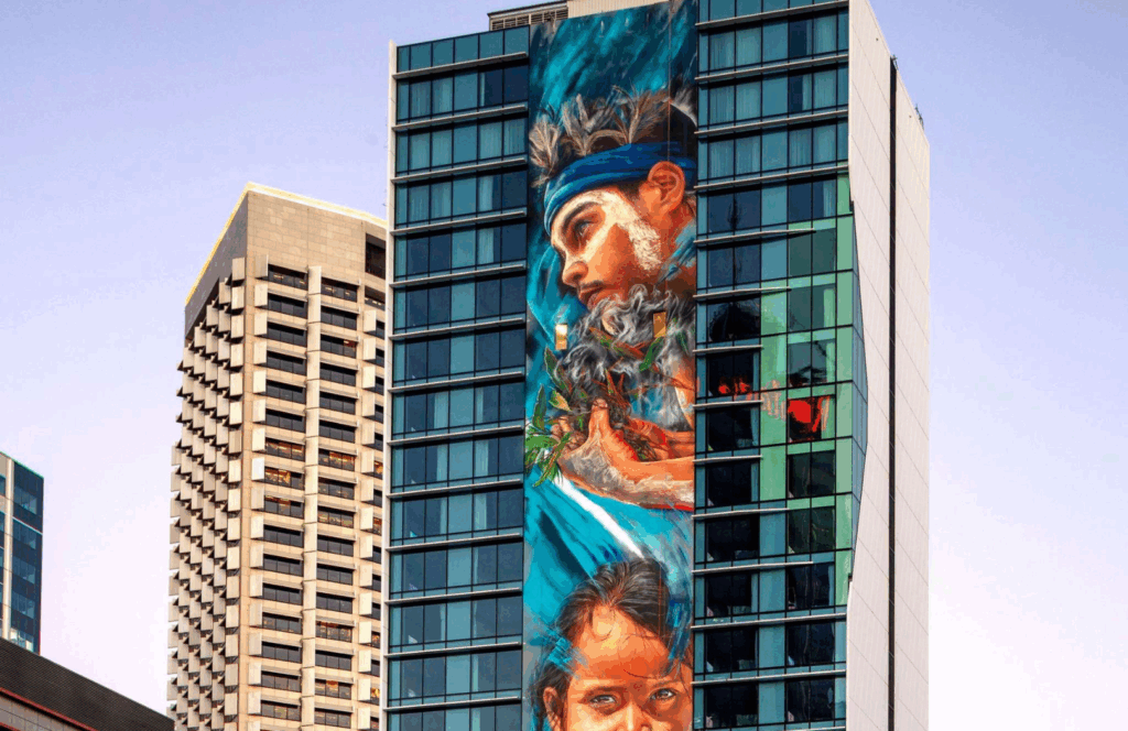 Large mural on the exterior of the Adnate hotel in Perth.